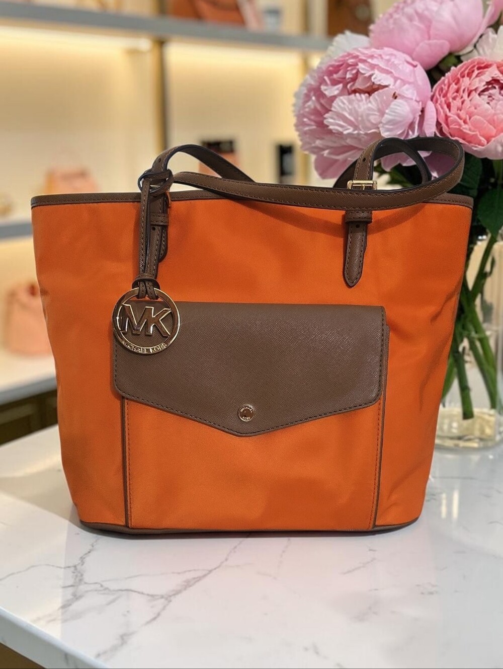 Michael Kors nylon tote bag with brown leather trim W/ Front snap pocket